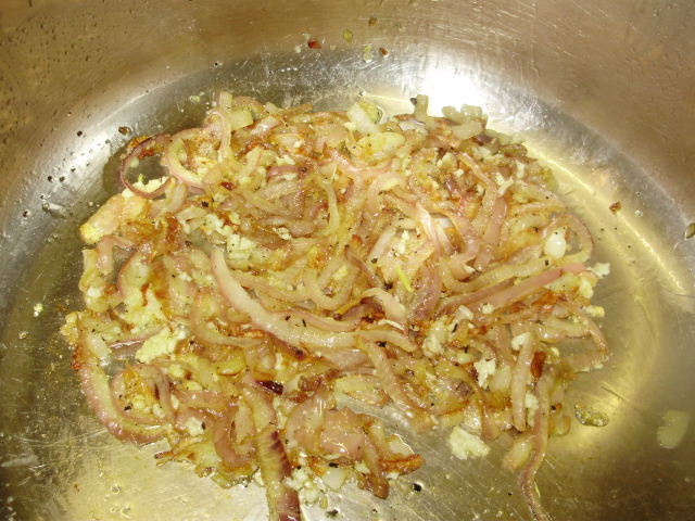 2. When onions are soft, almost cooked & golden - add crushed garlic to pan for the last minute or so