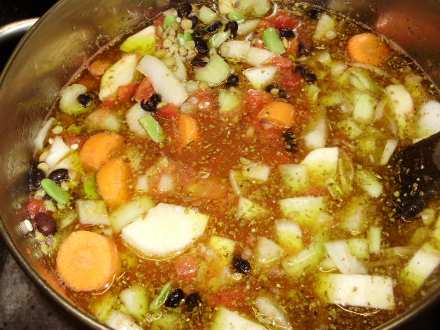 3. Stock added to ingredients and put on to simmer