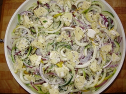 Creamy courgette, mushroom and red onion gratin with garlic & thyme