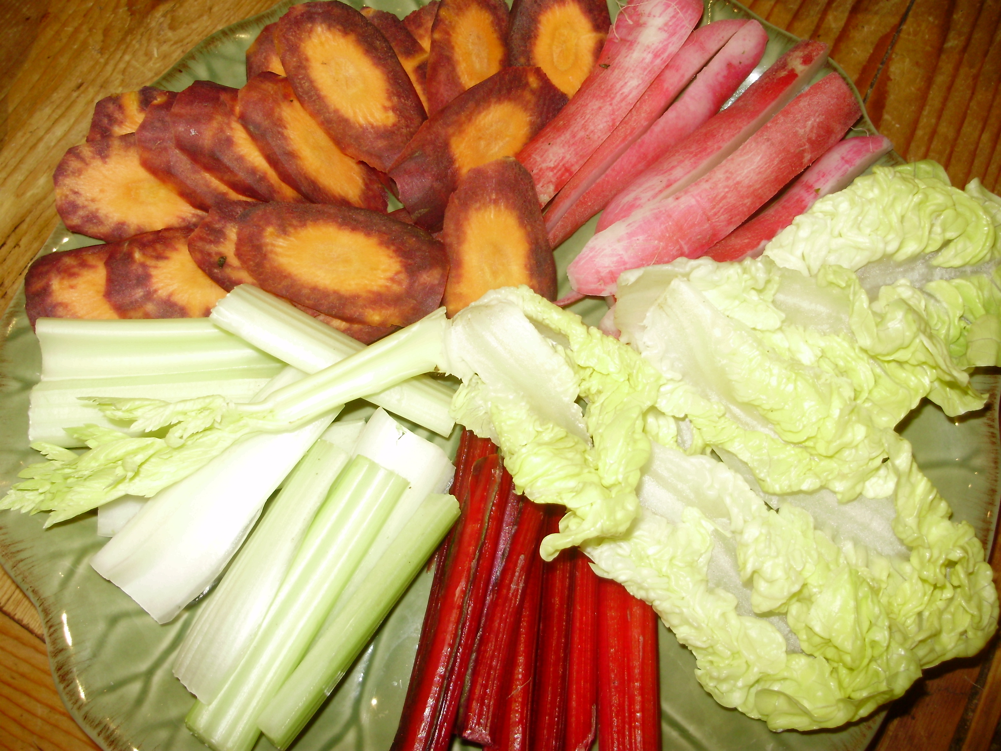 5. Selection of vegetable crudites for dip. Celery, purple carrots, radish Pink Dragon, Little Gem hearts & ruby chard stems.
