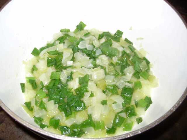For champ 2. Gently sweat the onion in butter until translucent then add green onion tops & stir together for 1 minute