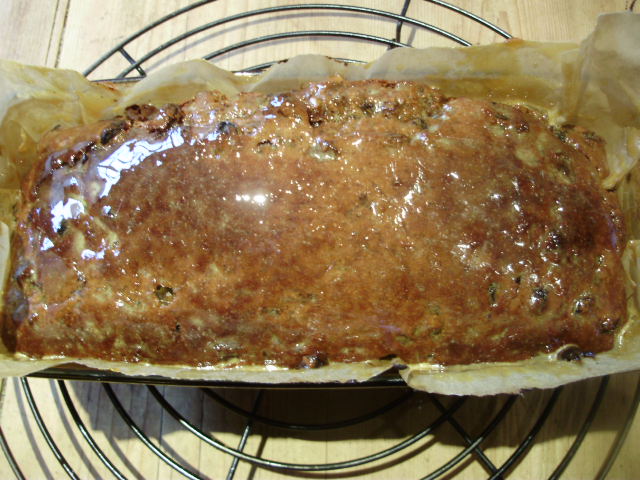 The top of the hot brack brushed with malt after coming out of the oven