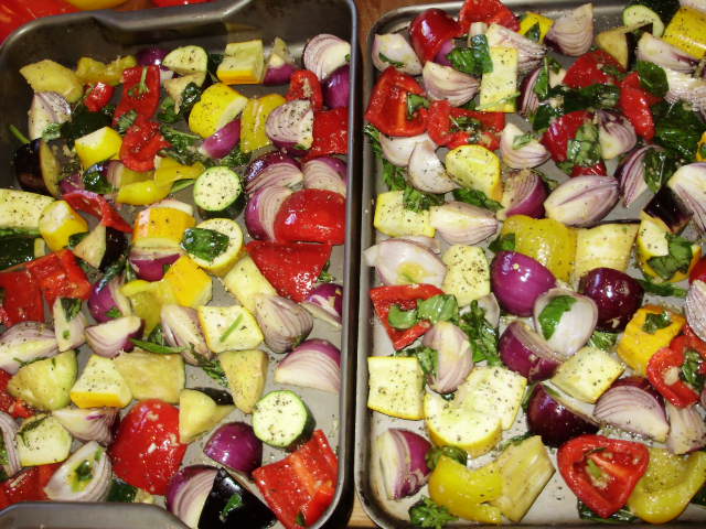 10. Divide veg evenly between the hot trays, without crowding, season with salt & black pepper