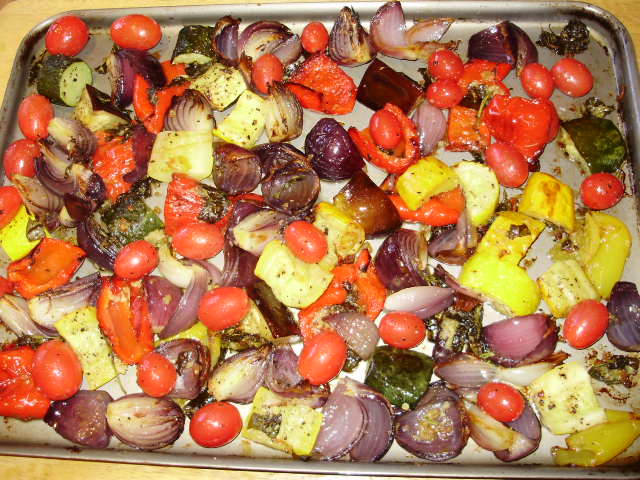 12b. Lightly coat tomatoes with oil, season & add to trays, return to oven