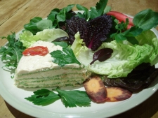 3. Smoked Salmon & Watercress layered wrap cake slice served with salad